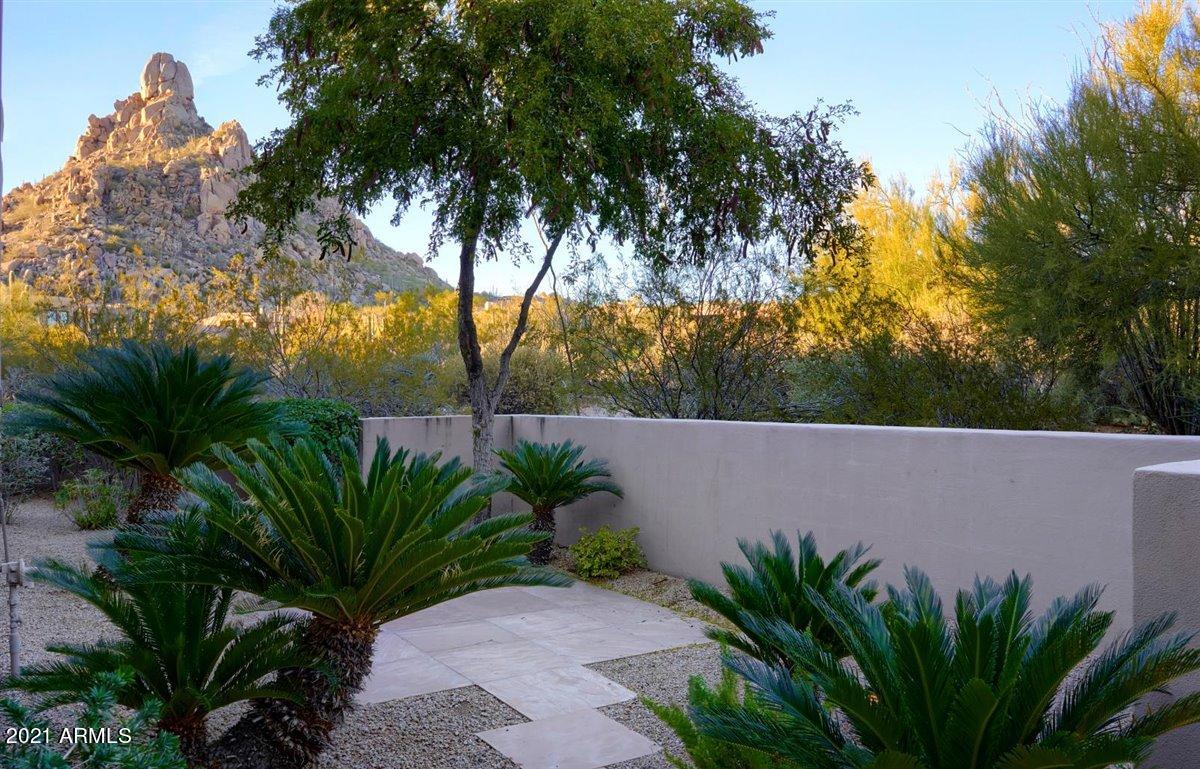 10040 East Happy Valley Road, Unit 661 Scottsdale, AZ 85255 - Photo 65 of 69 Private guest patio with Pinnacle Peak v