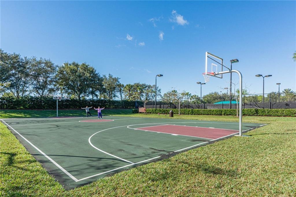 1931 Grey Falcon Circle Southwest Vero Beach, FL 32962 - Photo 32 of 36 a view of a tennis court
