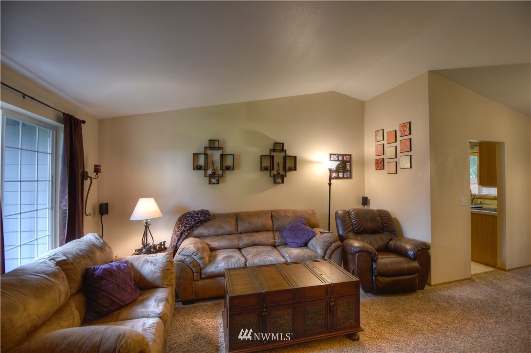 5423 187th Court Southwest Rochester, WA 98579 - Photo 3 of 24 a living room with furniture and a couch