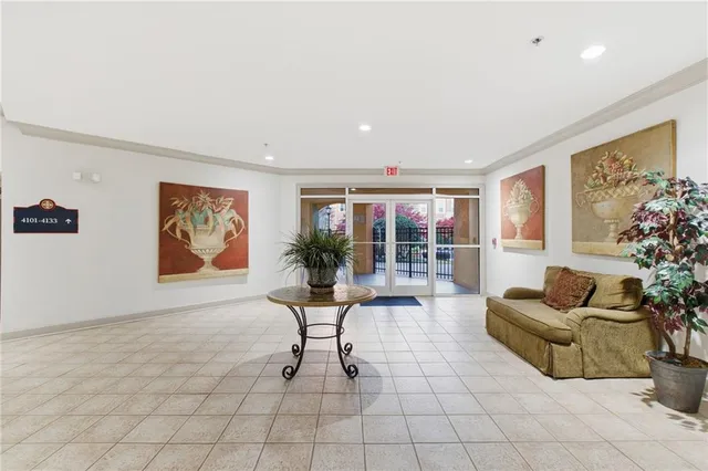 a view of a street with a building in the background