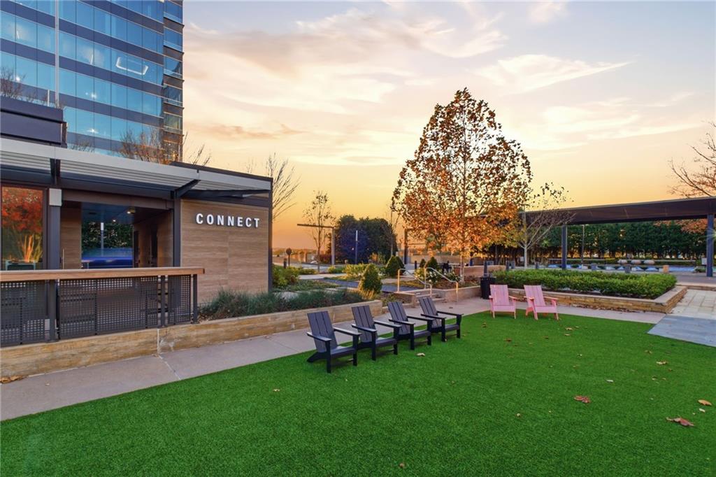 10 Perimeter Summit Boulevard, Unit 4439 Atlanta, GA 30319 - Photo 35 of 69 a view of a house with a yard and sitting area
