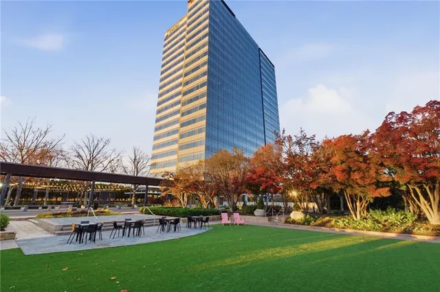a view of a chairs and tables in the patio