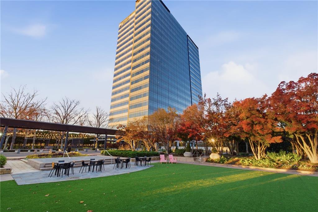 10 Perimeter Summit Boulevard, Unit 4439 Atlanta, GA 30319 - Photo 36 of 69 a view of a chairs and table in the garden