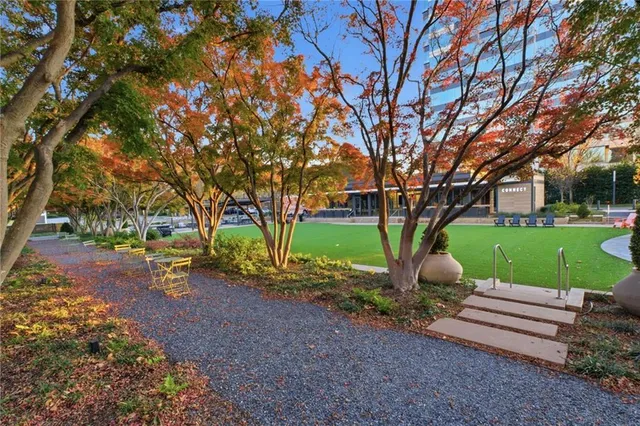 a kitchen with a table and chairs in it