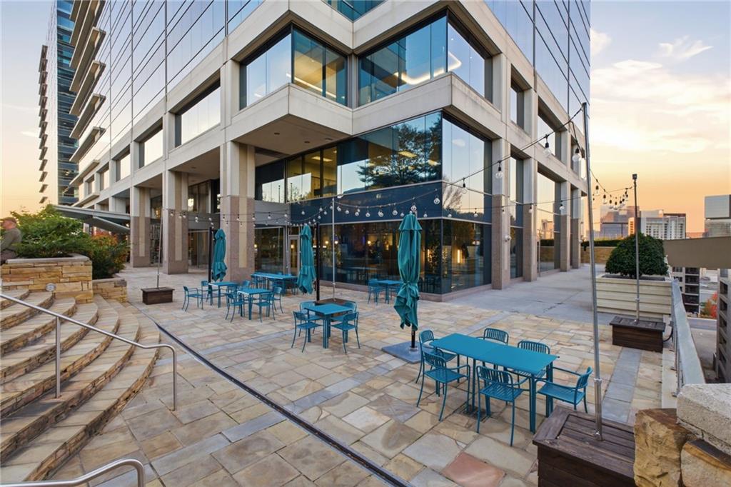 10 Perimeter Summit Boulevard, Unit 4439 Atlanta, GA 30319 - Photo 44 of 69 a view of a building with sitting area