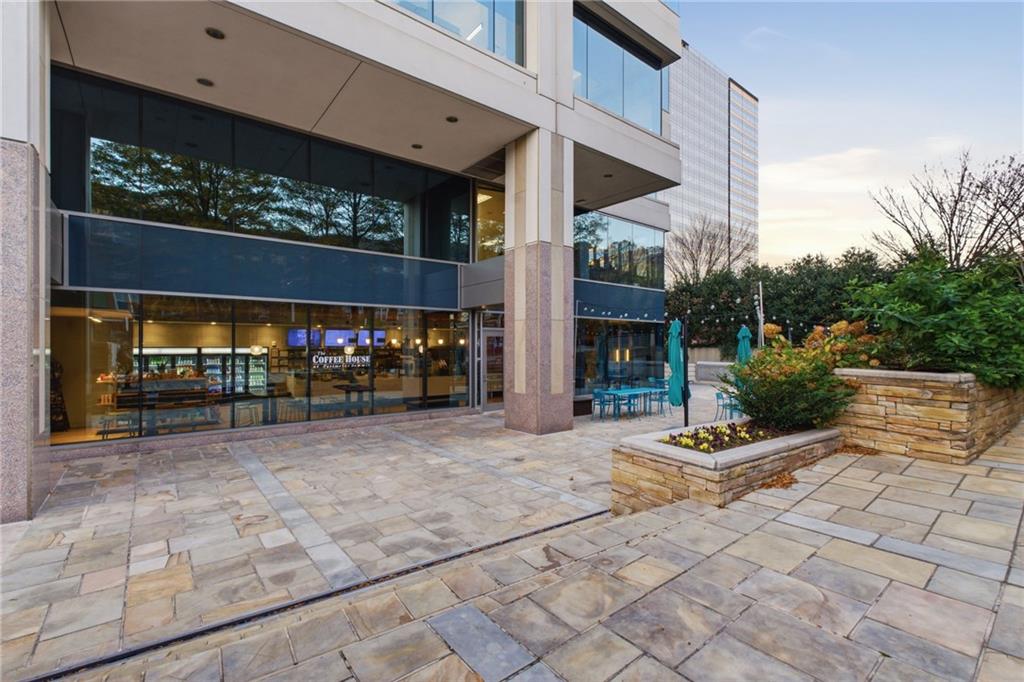 10 Perimeter Summit Boulevard, Unit 4439 Atlanta, GA 30319 - Photo 46 of 69 a view of a chairs and tables in the patio