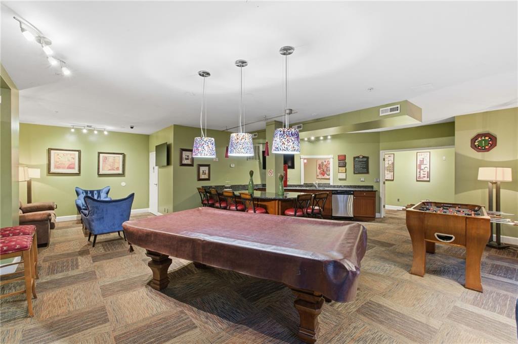 10 Perimeter Summit Boulevard, Unit 4439 Atlanta, GA 30319 - Photo 50 of 69 a view of a dining room with furniture