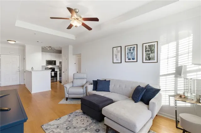 a bedroom with a bed a table and chair