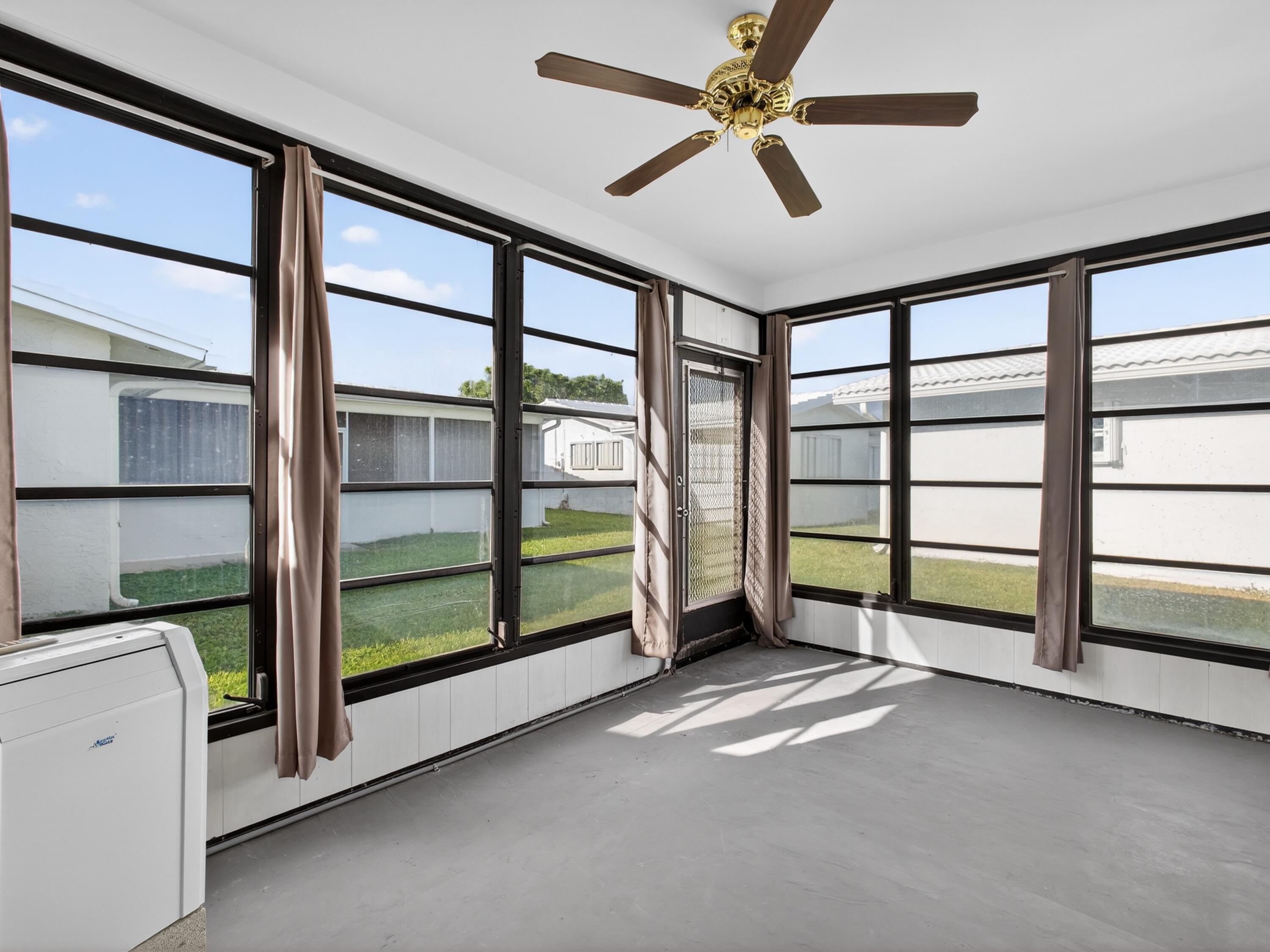 2003 Southwest 17th Street Boynton Beach, FL 33426 - Photo 16 of 38 Enclosed Porch