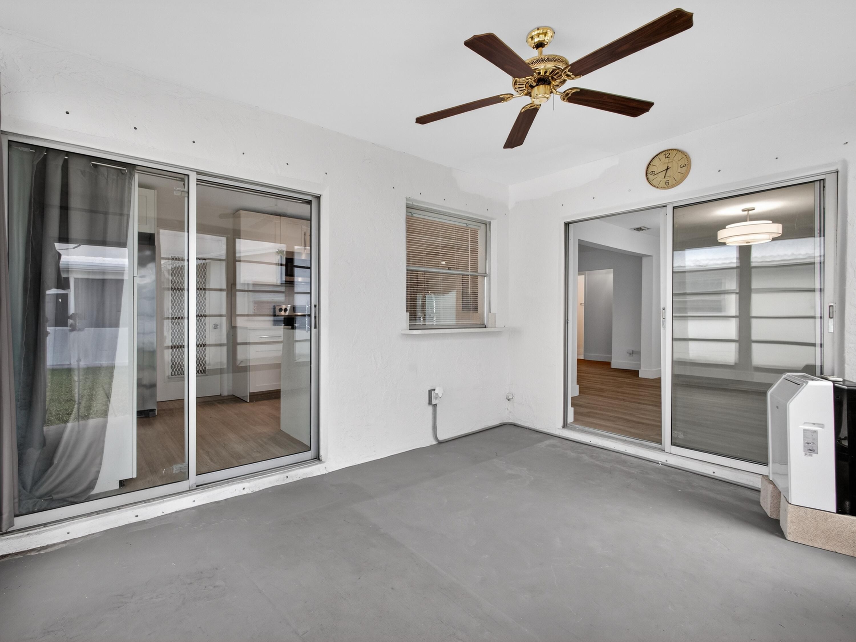 2003 Southwest 17th Street Boynton Beach, FL 33426 - Photo 18 of 38 Enclosed Porch