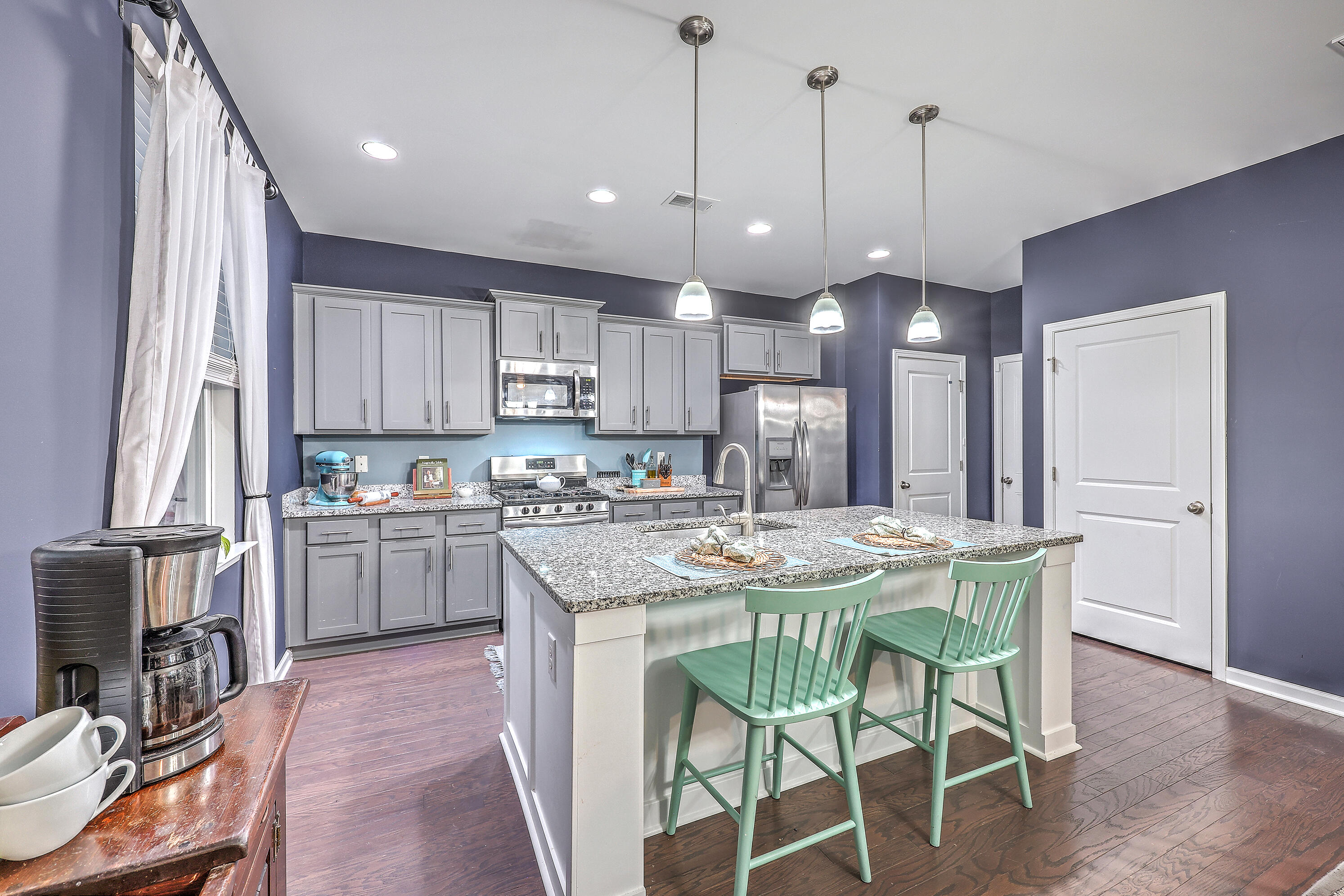643 Woolum Drive Moncks Corner, SC 29461 - Photo 8 of 29 Kitchen with Island and Pantry