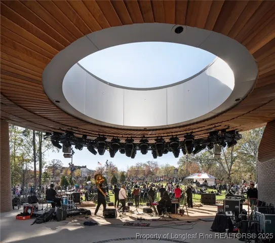 a view of a patio with table and chairs