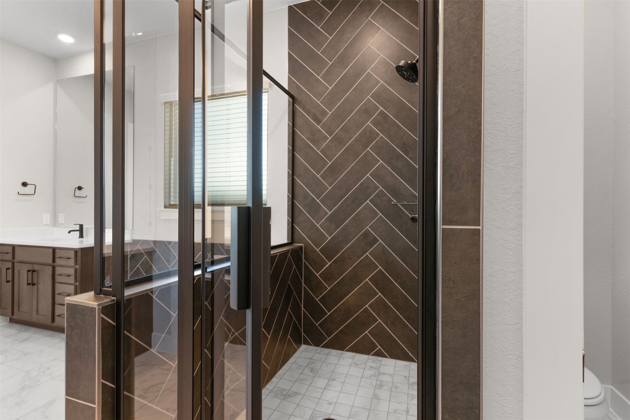 17216 Hope Bergman Road Pflugerville, TX 78660 - Photo 18 of 30 Bathroom with a stall shower and vanity