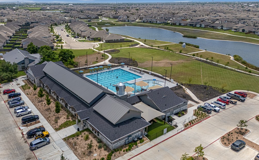 17216 Hope Bergman Road Pflugerville, TX 78660 - Photo 26 of 30 Aerial view of residential area featuring a large body of water and a pool area