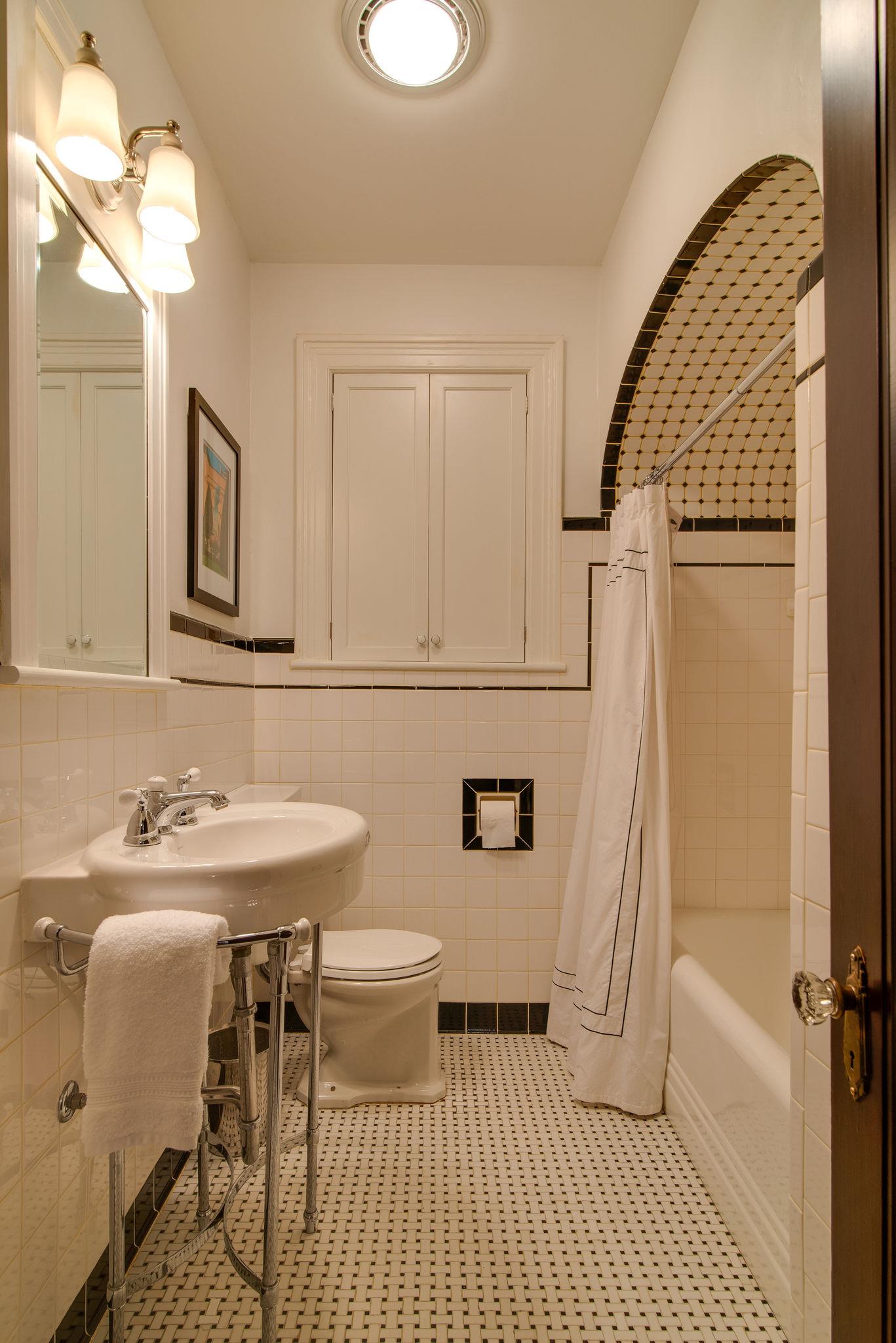 113 Mockingbird Road Nashville, TN 37205 - Photo 17 of 30 a bathroom with a sink toilet and shower