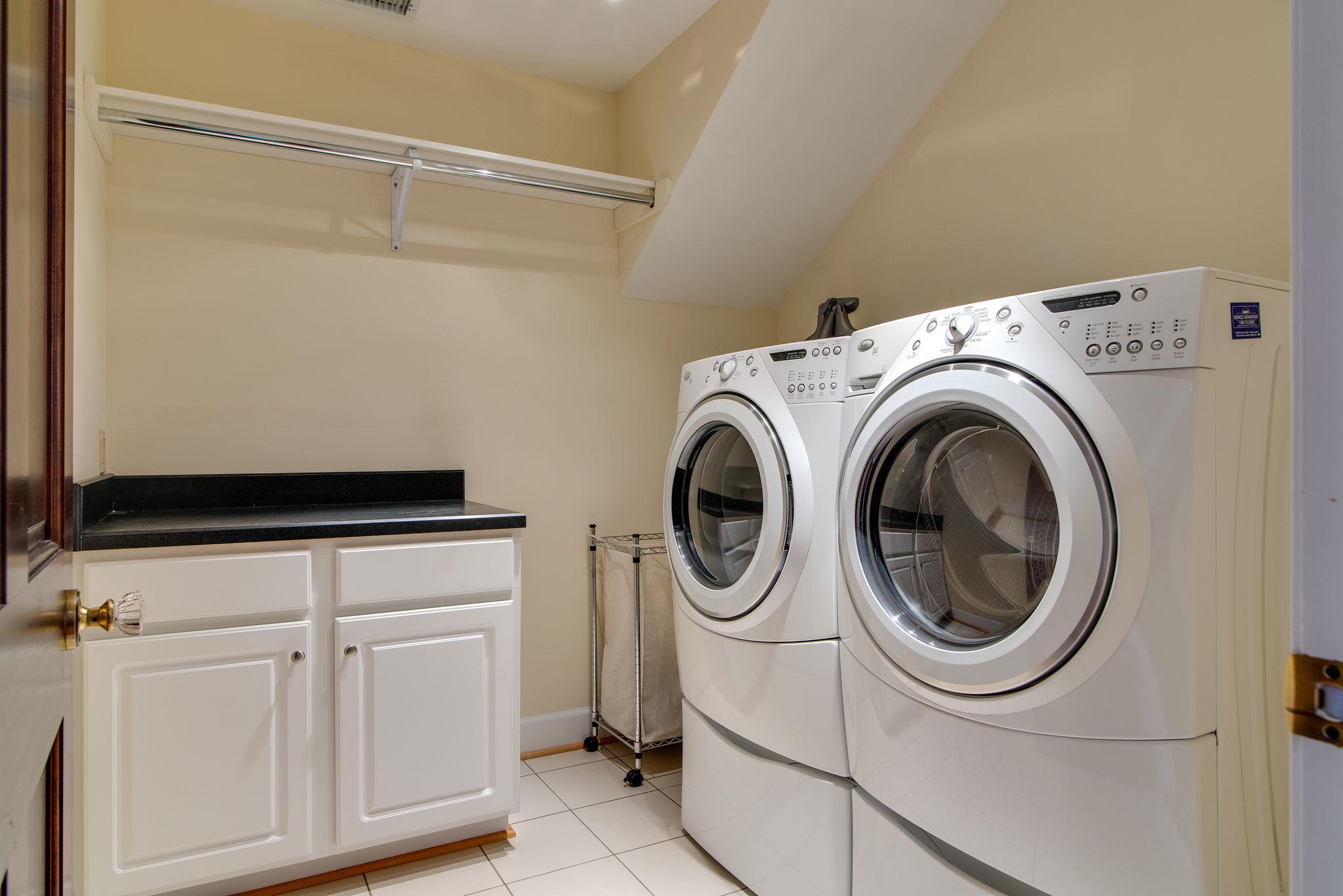 113 Mockingbird Road Nashville, TN 37205 - Photo 25 of 30 a utility room with dryer and washer