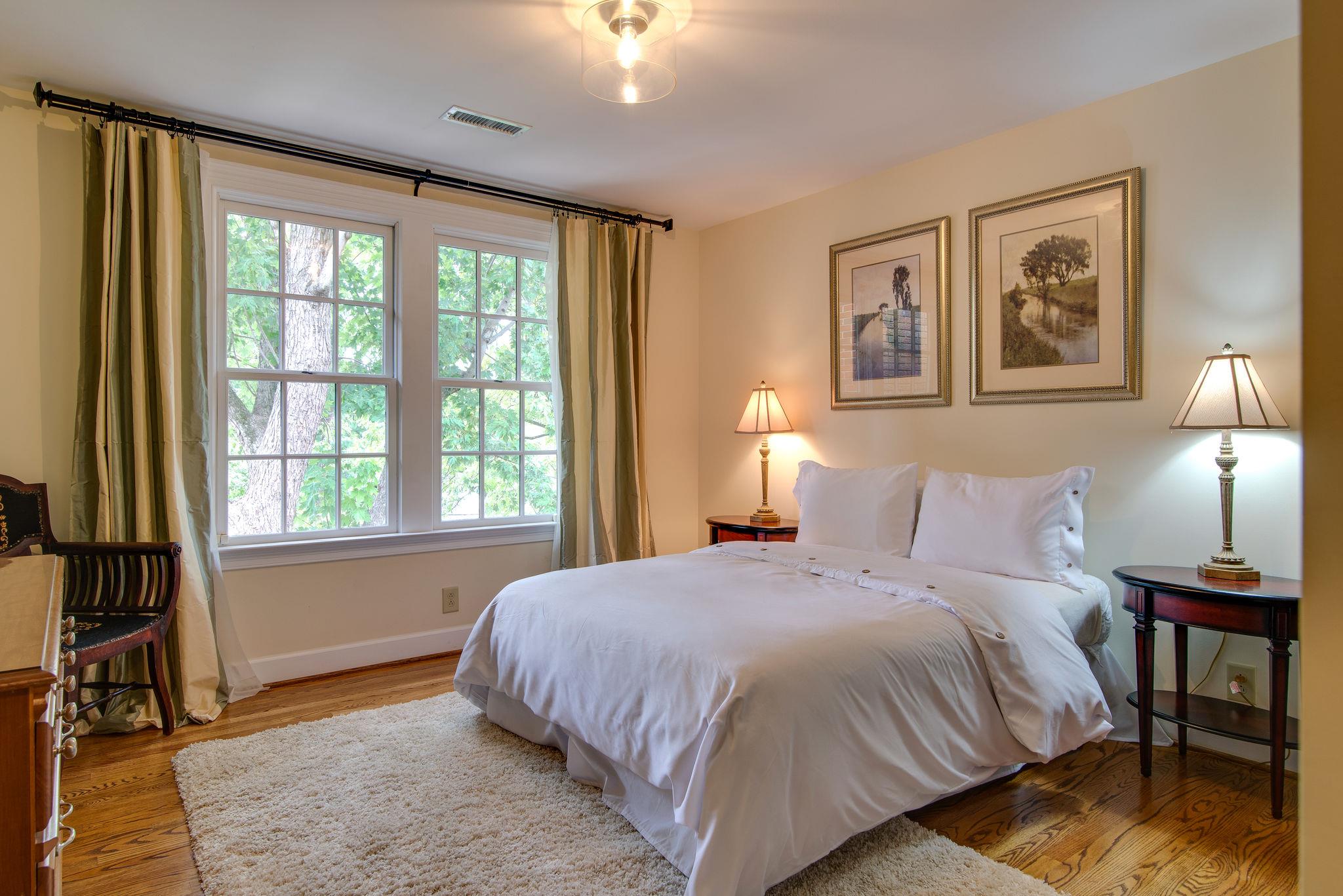 113 Mockingbird Road Nashville, TN 37205 - Photo 26 of 30 a bedroom with a bed and a window
