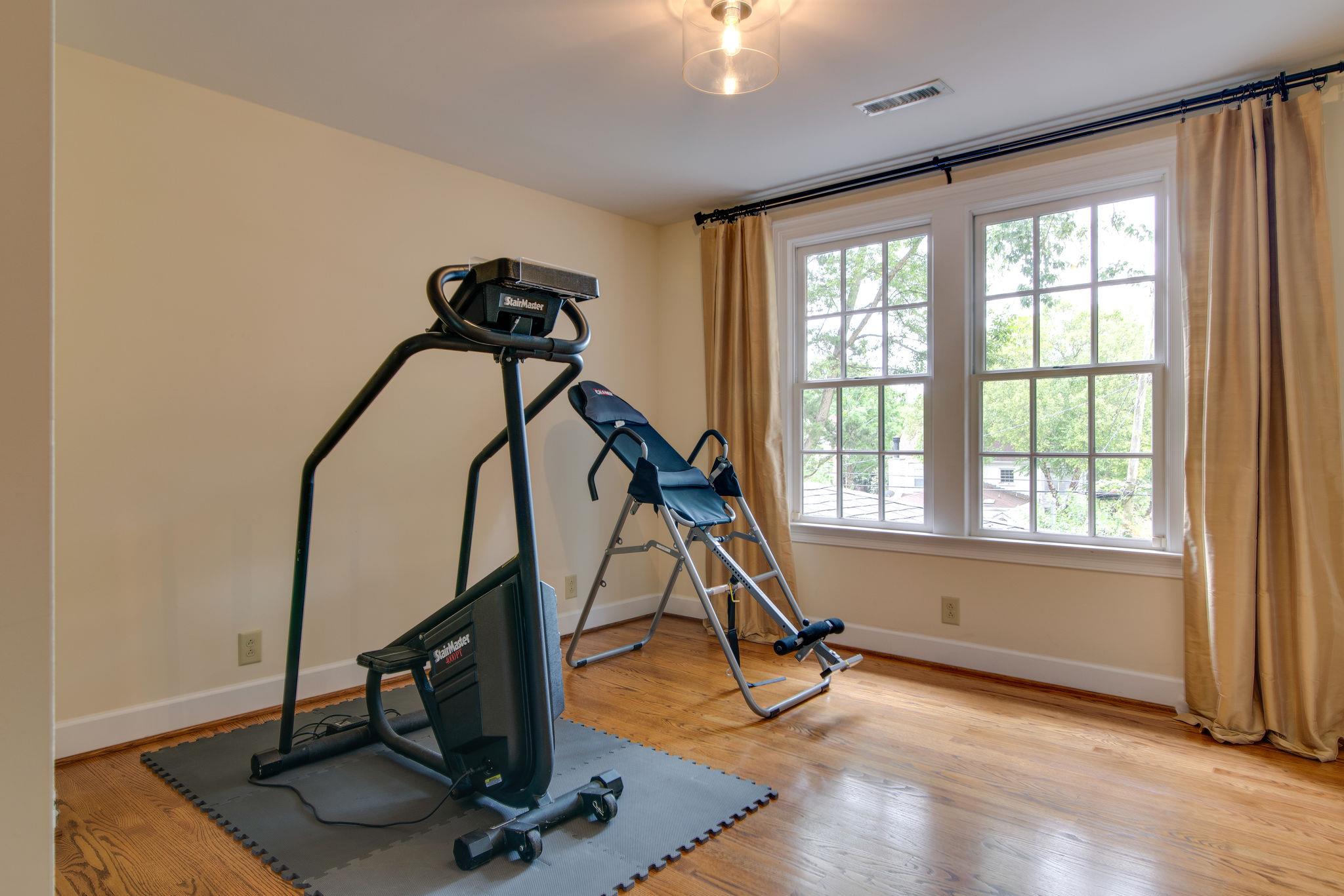 113 Mockingbird Road Nashville, TN 37205 - Photo 27 of 30 a view of a room with gym equipment