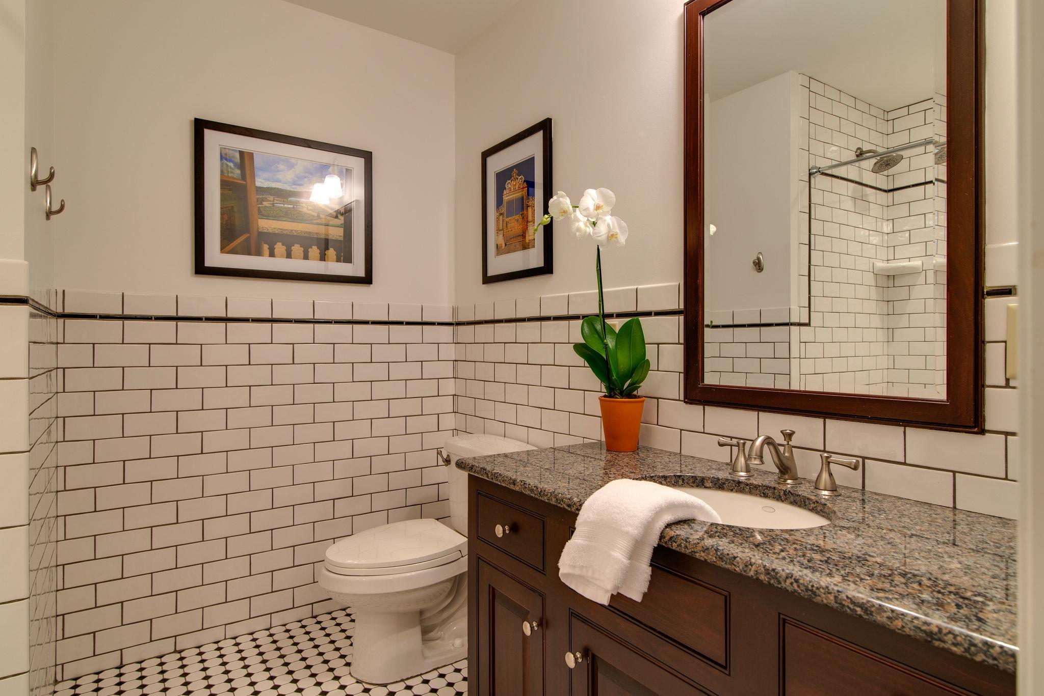 113 Mockingbird Road Nashville, TN 37205 - Photo 28 of 30 a bathroom with a granite countertop toilet sink and mirror