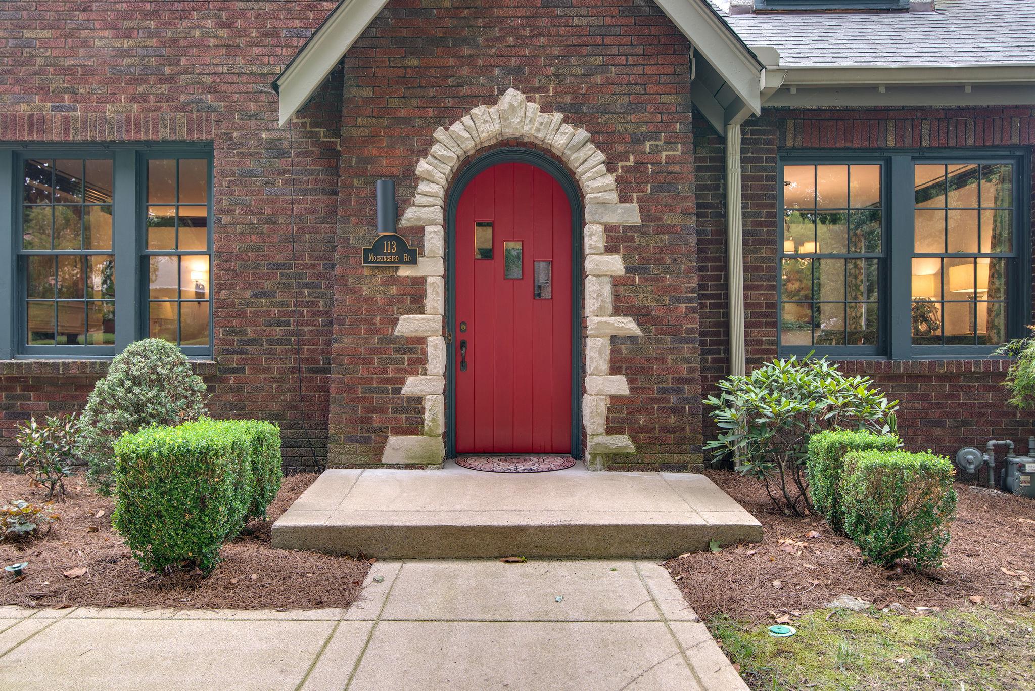 113 Mockingbird Road Nashville, TN 37205 - Photo 30 of 30 a view of a brick house with potted plants