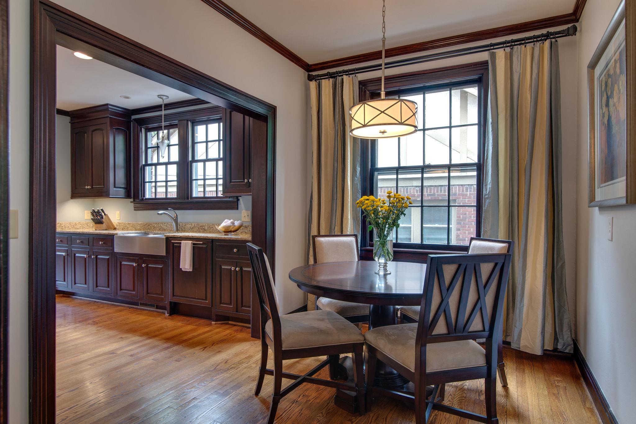 113 Mockingbird Road Nashville, TN 37205 - Photo 8 of 30 a view of a dining room with furniture window and wooden floor