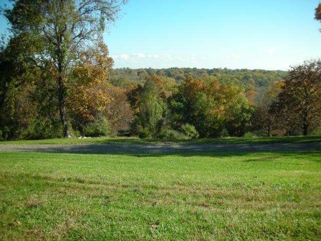 48 Keelers Ridge Road Wilton, CT 06897 - Photo 1 of 1 a view of a green yard