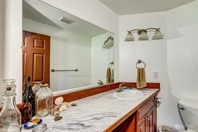 a view of balcony with wooden floor and fence