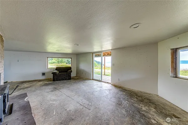 an empty room with windows