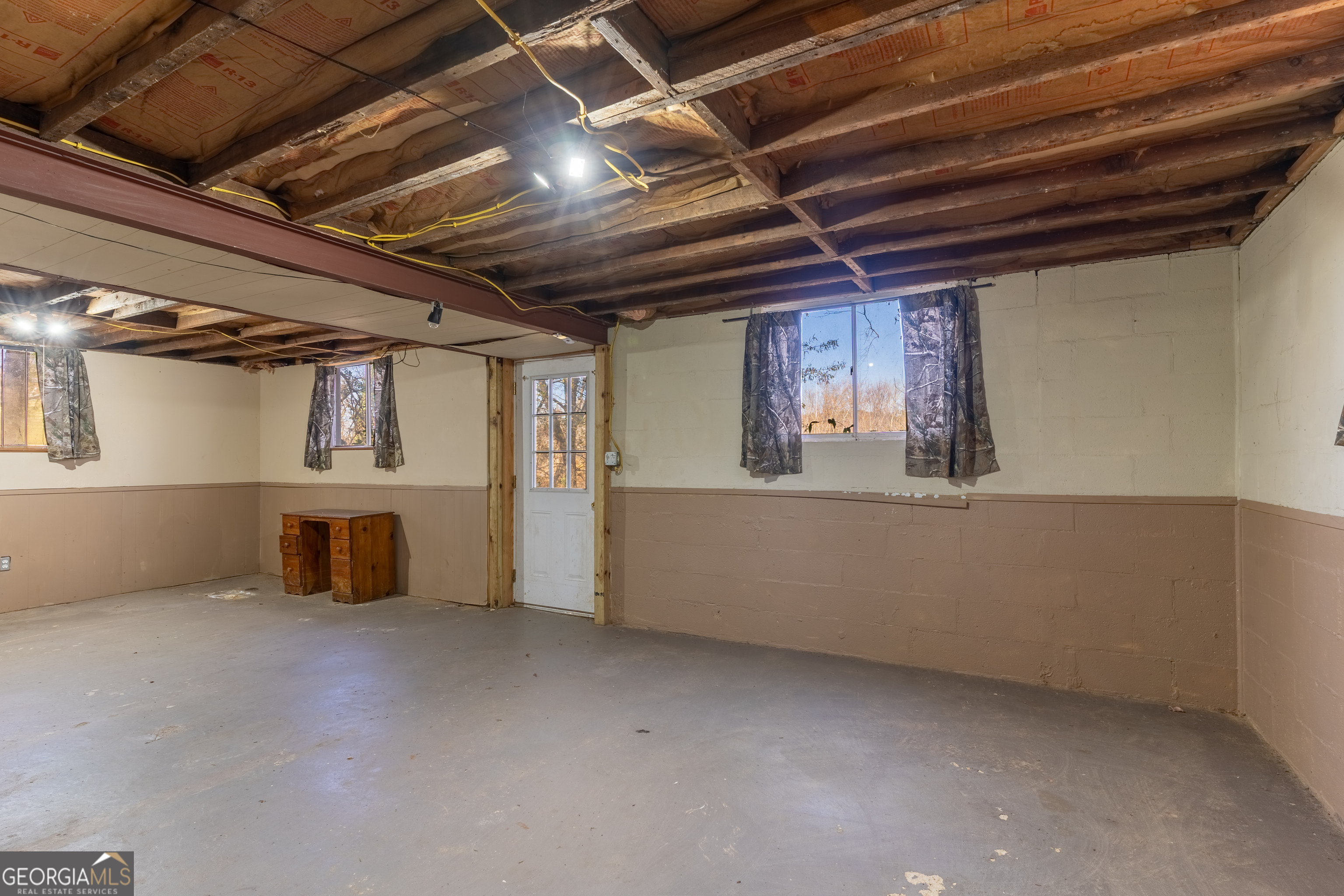 139 Cherokee Drive Jackson, GA 30233 - Photo 19 of 34 a view of a room with wooden walls
