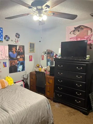 a bedroom with toys and a couch