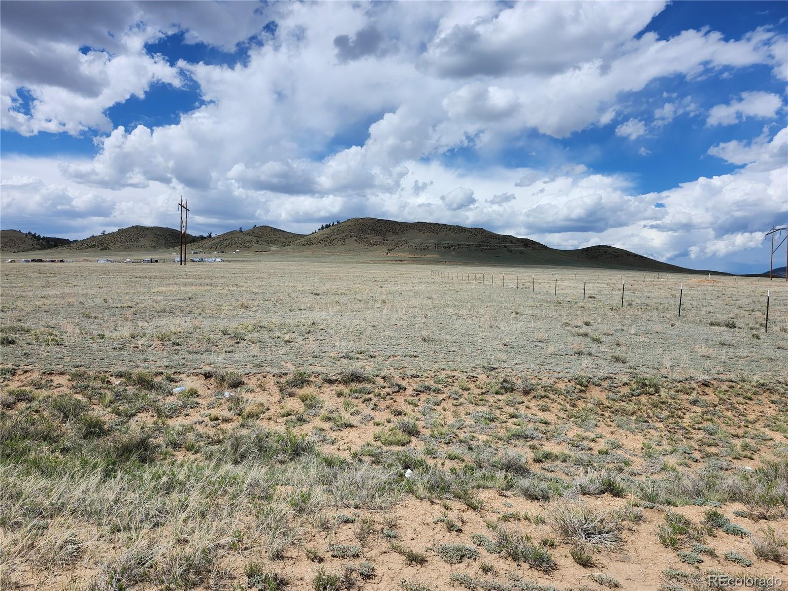 4741 Routt Road Hartsel, CO 80449 - Photo 5 of 9 a view of a lake in between large trees