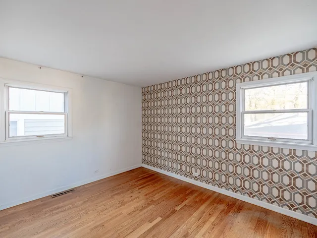 a view of an empty room and window