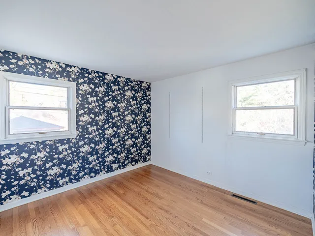 a view of a big room with wooden floor
