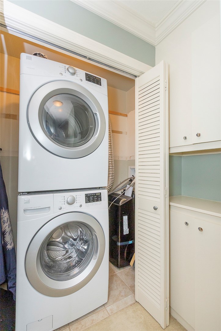 7 Harbor Gate, Unit 7 BUILDING 2 Anderson, SC 29625 - Photo 23 of 47 This dedicated laundry area offers a practical and organized space for household tasks.