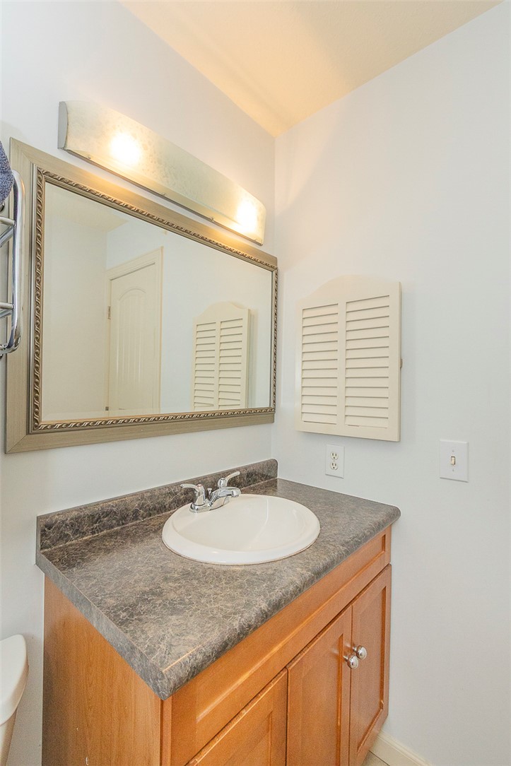 7 Harbor Gate, Unit 7 BUILDING 2 Anderson, SC 29625 - Photo 24 of 47 This bathroom features a sleek vanity with a spacious countertop and a prominent mirror.