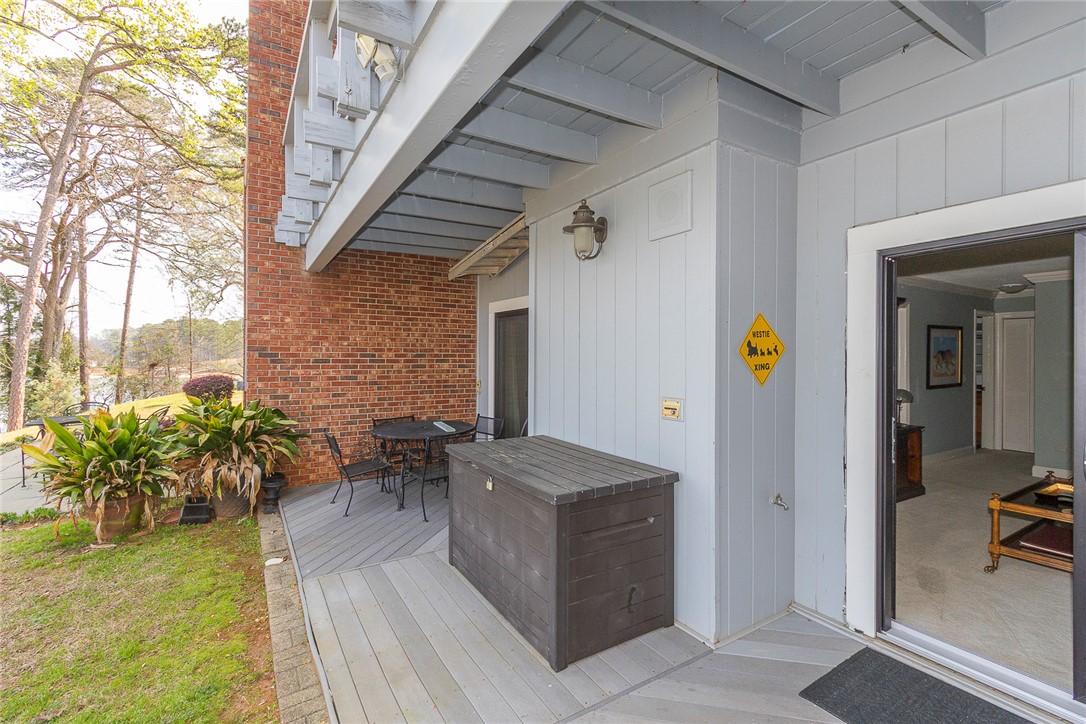 7 Harbor Gate, Unit 7 BUILDING 2 Anderson, SC 29625 - Photo 33 of 47 This inviting patio offers a tranquil retreat with ample space for outdoor enjoyment and scenic views.