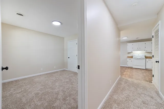 a view of a kitchen and a sink