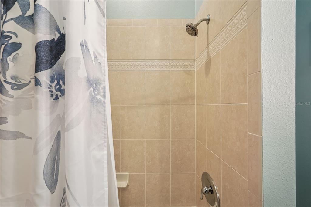 626 May Apple Way Venice, FL 34293 - Photo 32 of 60 a bathroom with a shower
