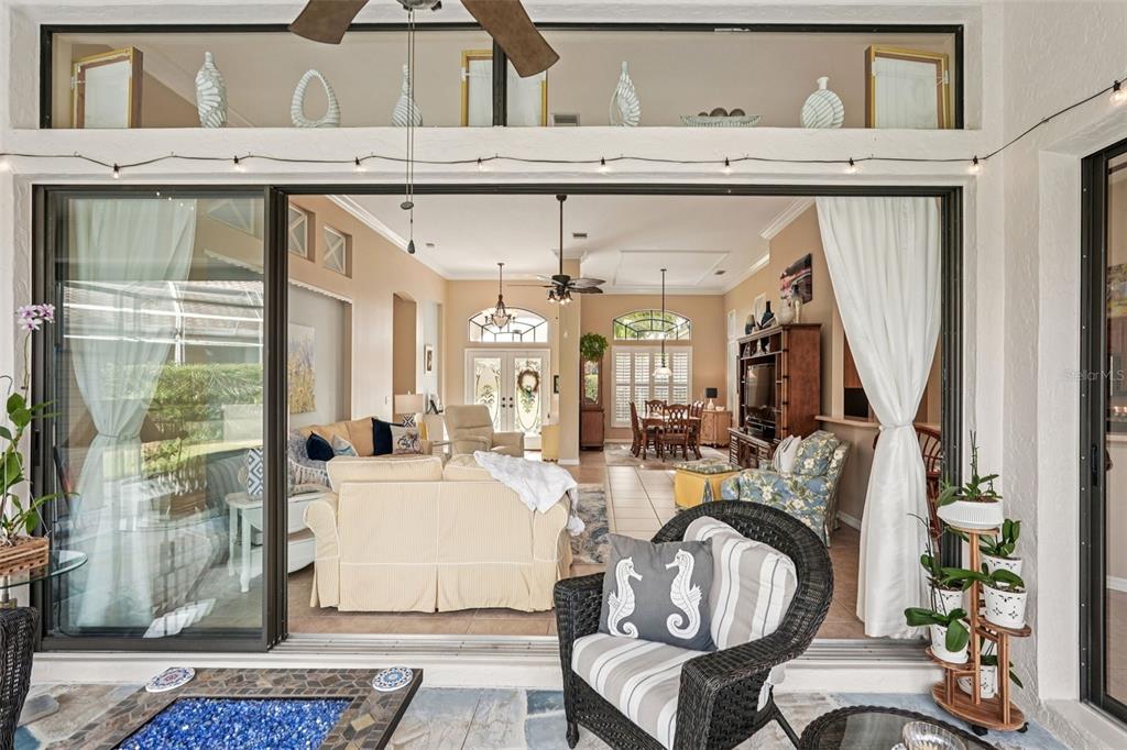 626 May Apple Way Venice, FL 34293 - Photo 37 of 60 a living room with furniture and a window