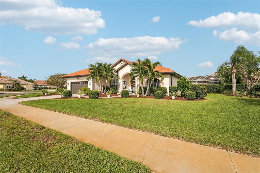626 May Apple Way Venice, FL 34293 - Photo 44 of 60 a view of building with outdoor space