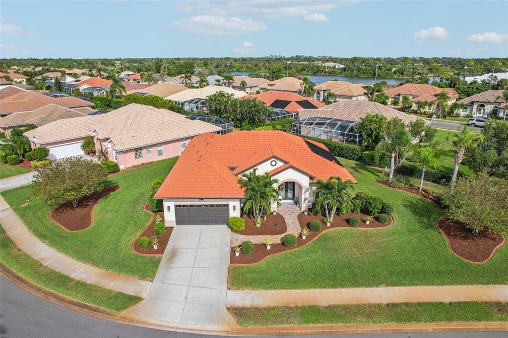 626 May Apple Way Venice, FL 34293 - Photo 51 of 60 an aerial view of residential houses with outdoor space and swimming pool