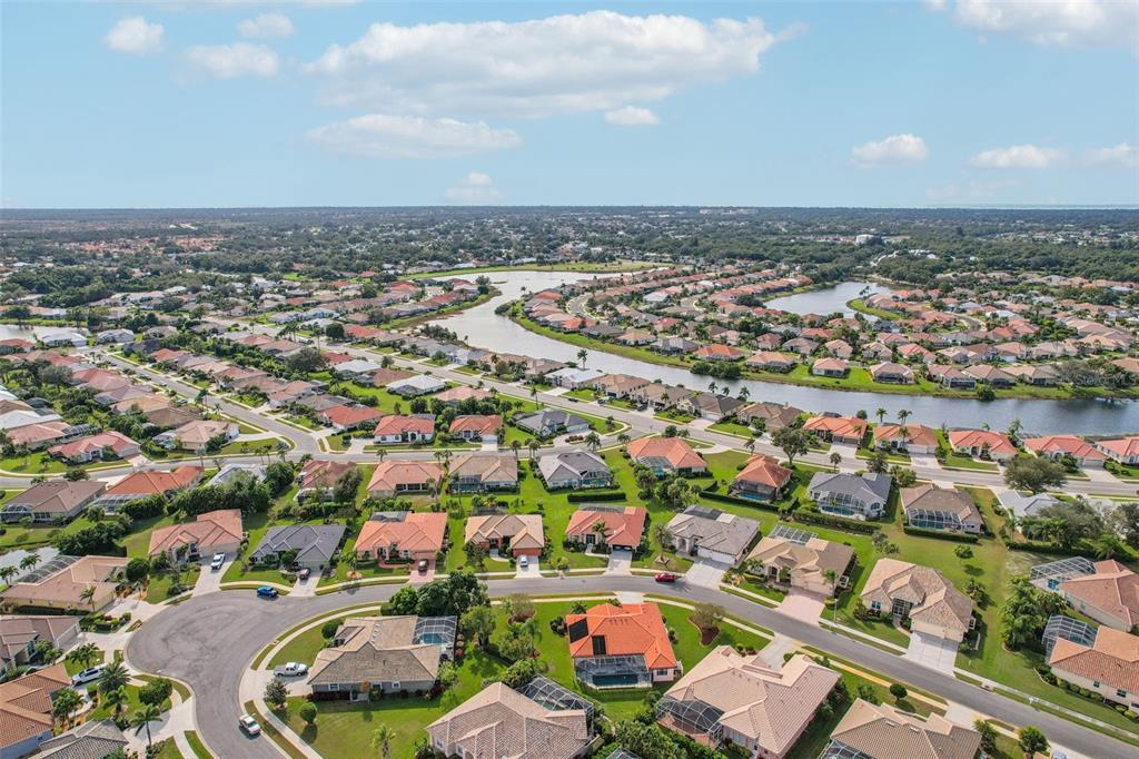 626 May Apple Way Venice, FL 34293 - Photo 55 of 60 an aerial view of a city