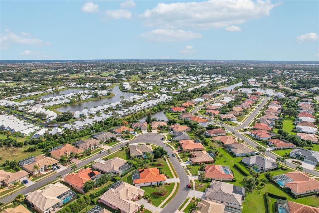 626 May Apple Way Venice, FL 34293 - Photo 57 of 60 an aerial view of a city with lots of residential buildings