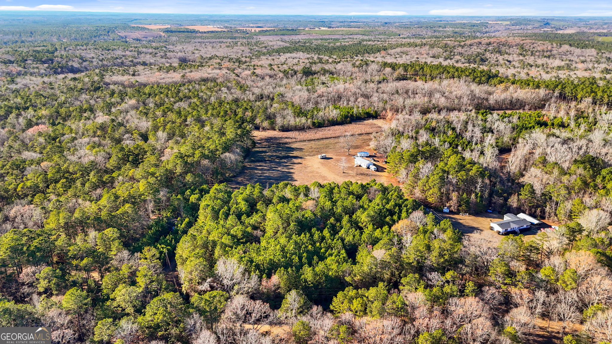 0 Giles Road Fort Valley, GA 31030 - Photo 3 of 8 an aerial view of residential houses with outdoor space