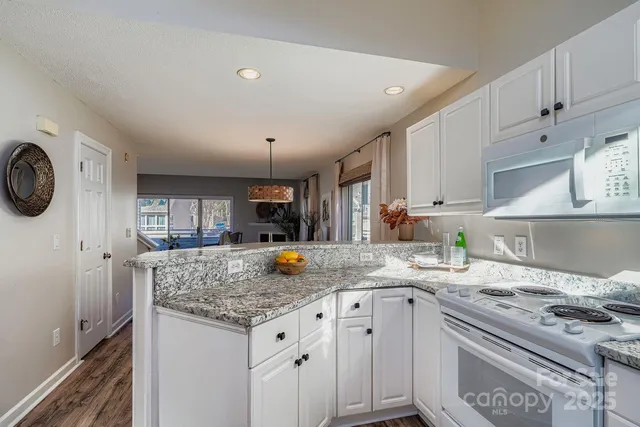 a kitchen with a stove and a sink