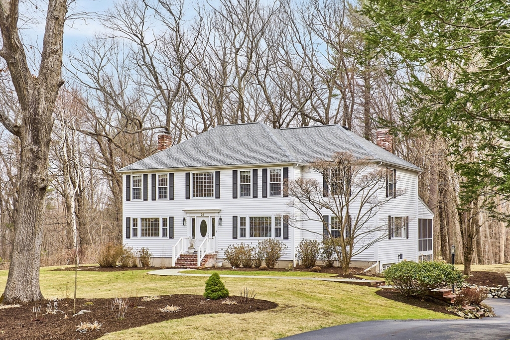 24 Greybirch Road Andover, MA 01810 - Photo 1 of 42 a front view of a house with a yard