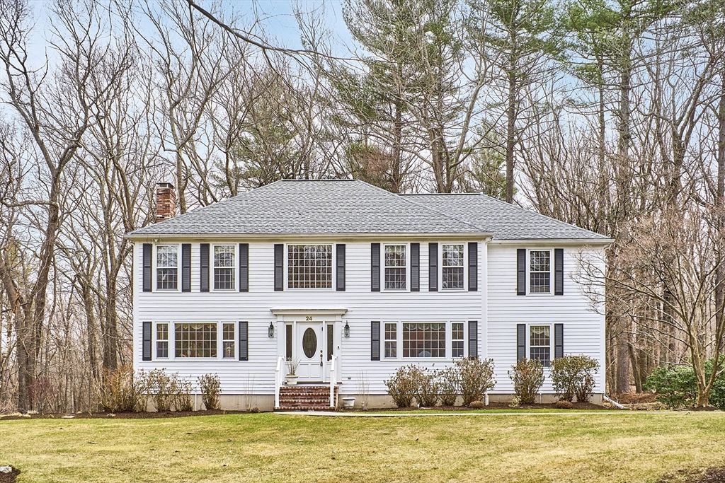 24 Greybirch Road Andover, MA 01810 - Photo 2 of 42 a front view of a house with a garden