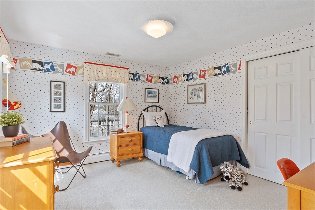 24 Greybirch Road Andover, MA 01810 - Photo 29 of 42 a bedroom with a bed and furniture