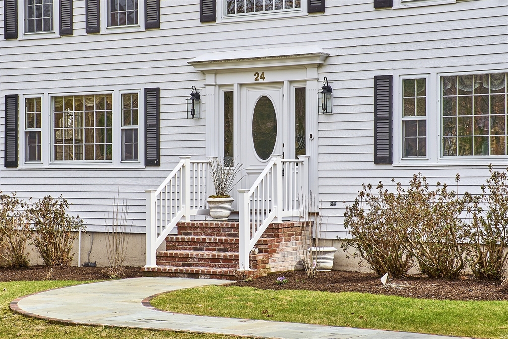 24 Greybirch Road Andover, MA 01810 - Photo 3 of 42 a front view of a house with a yard