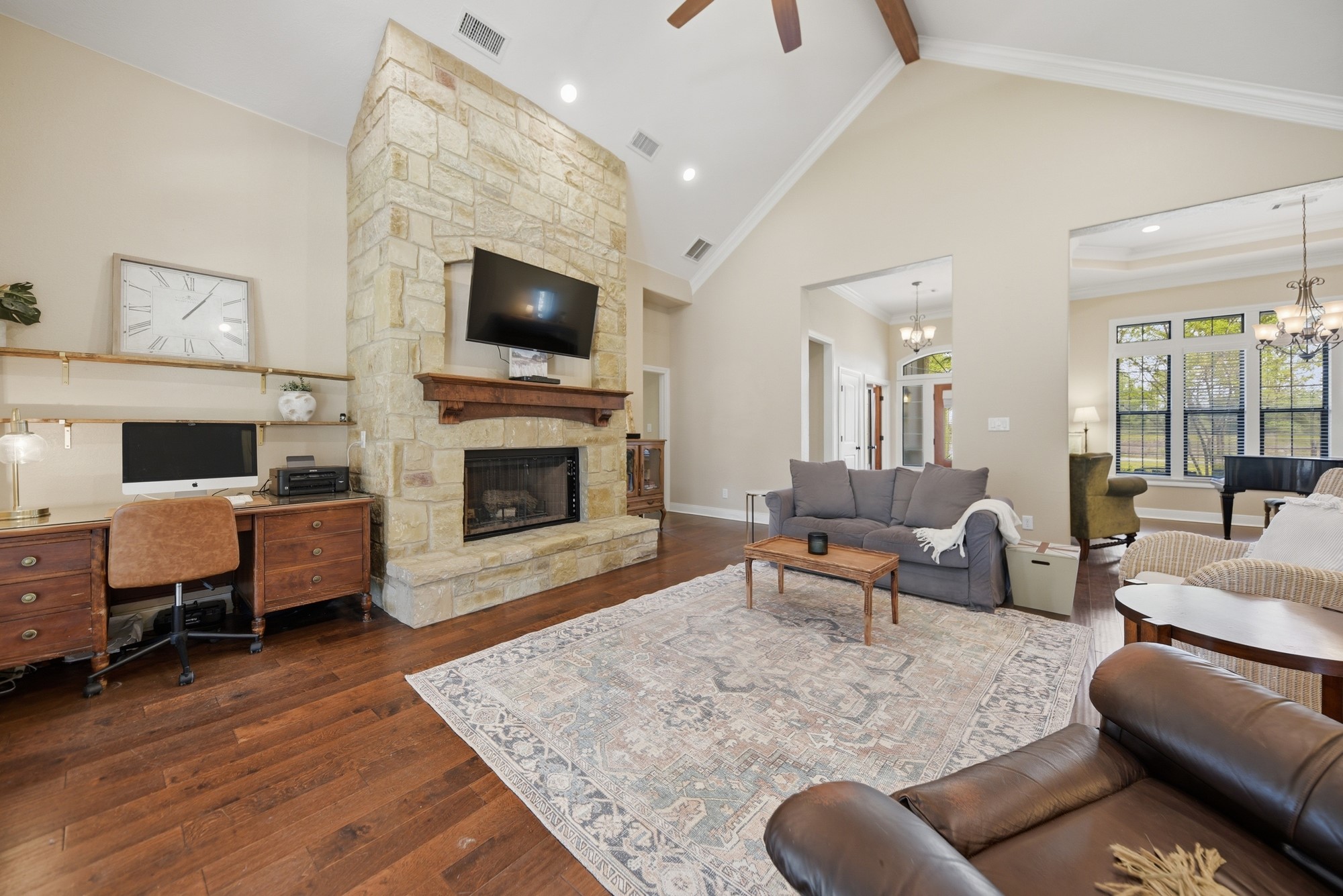 2245 Strangmeier Road Brenham, TX 77833 - Photo 17 of 40 The Living Room is anchored by the stunning stone fireplace.